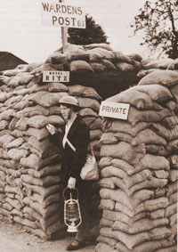 Photo: An Air Raid Warden at her post, ironically named the 'Hotel Ritz'