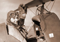 Photo: female pilot in a plane